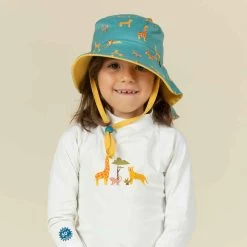 Chapeau Anti UV Bébé Réversible Jaune Et Bleu Imprimé SAVANE -Nager NABAIJI chapeau anti uv bebe reversible bleu et imprime palmiers 2